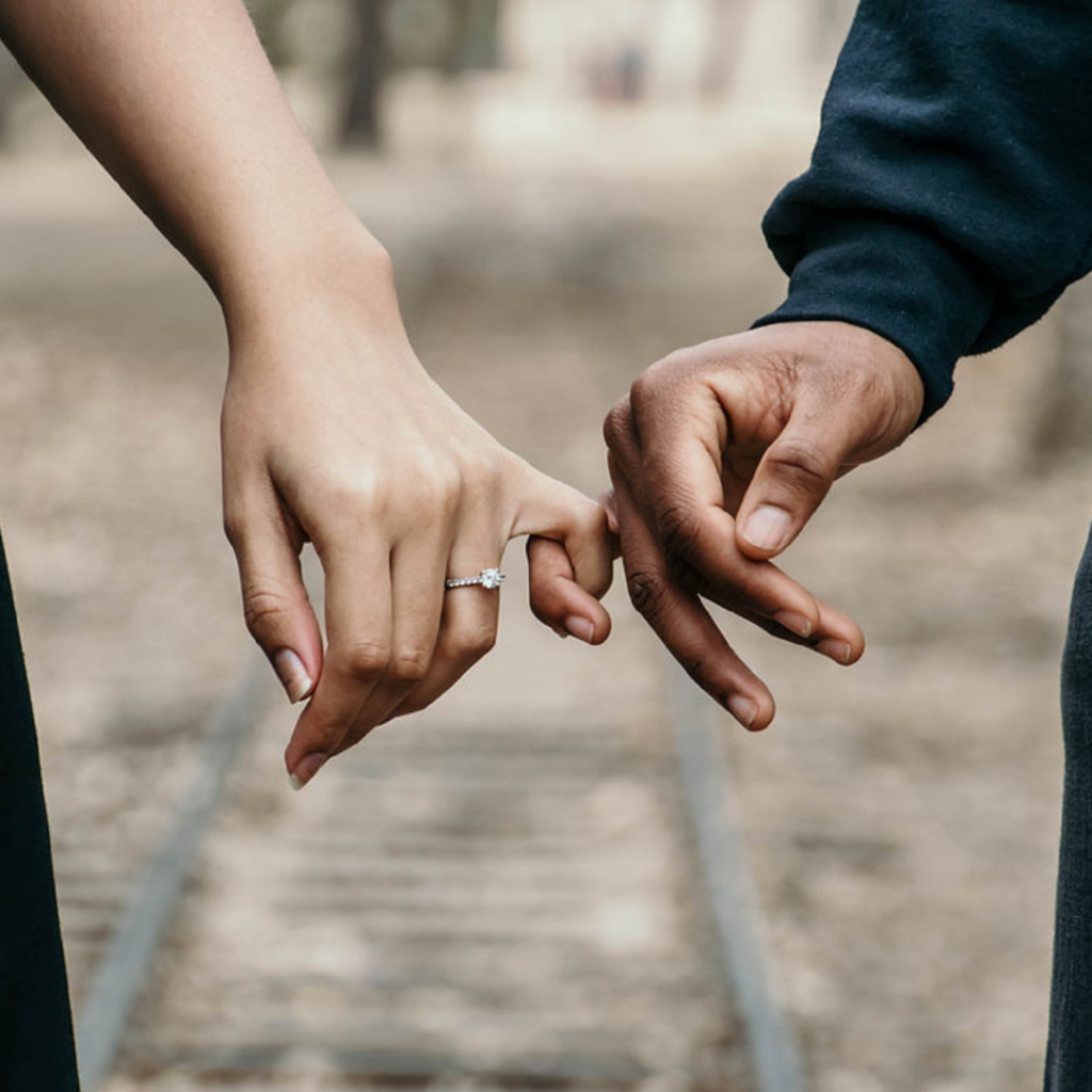 A couple holding hands 